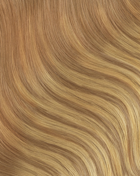 tape-in hair extensions blonde balayage.