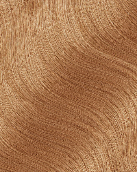 invisible clip-in hair extensions strawberry blonde.