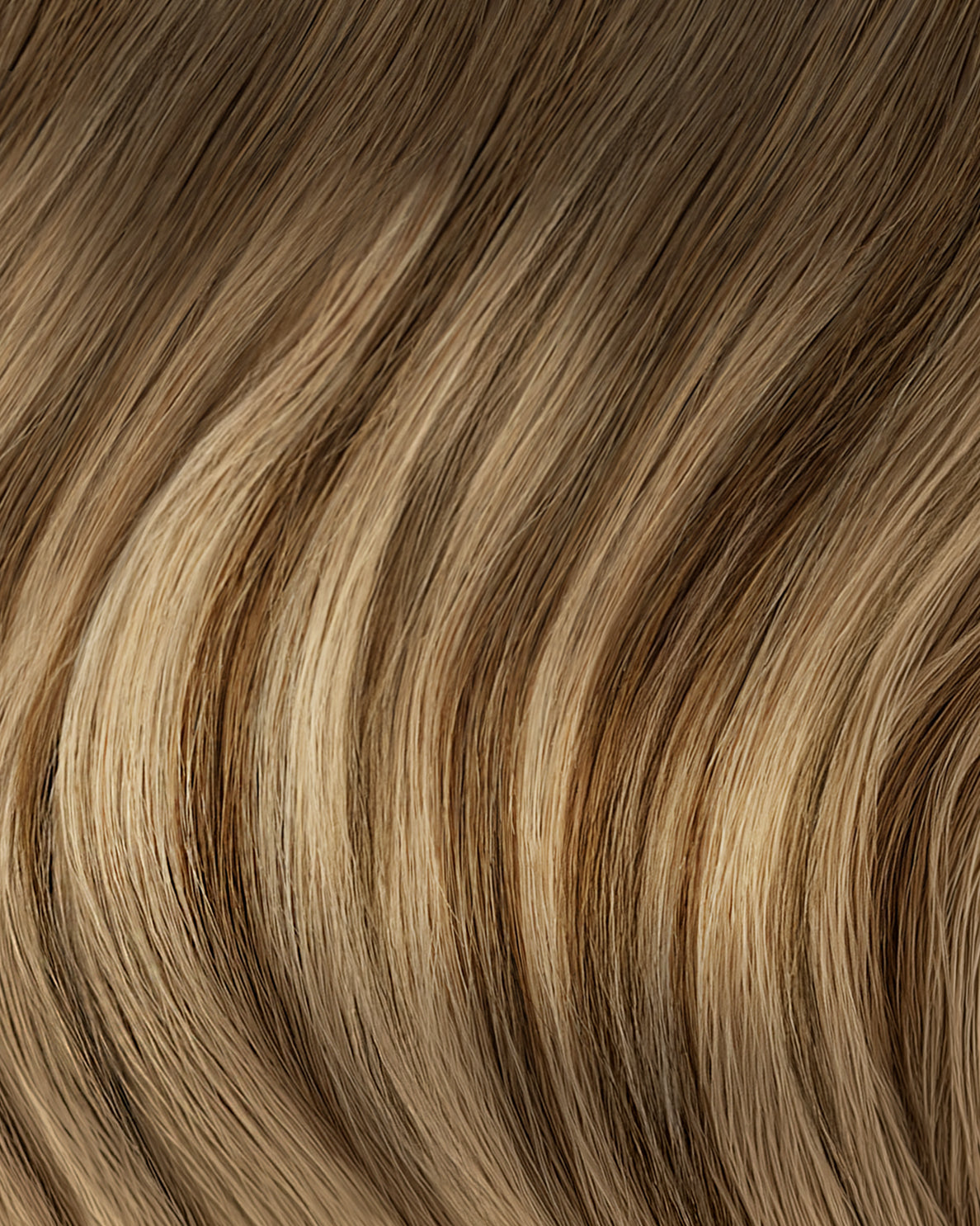 clip-in hair extensions teddy blonde balayage.