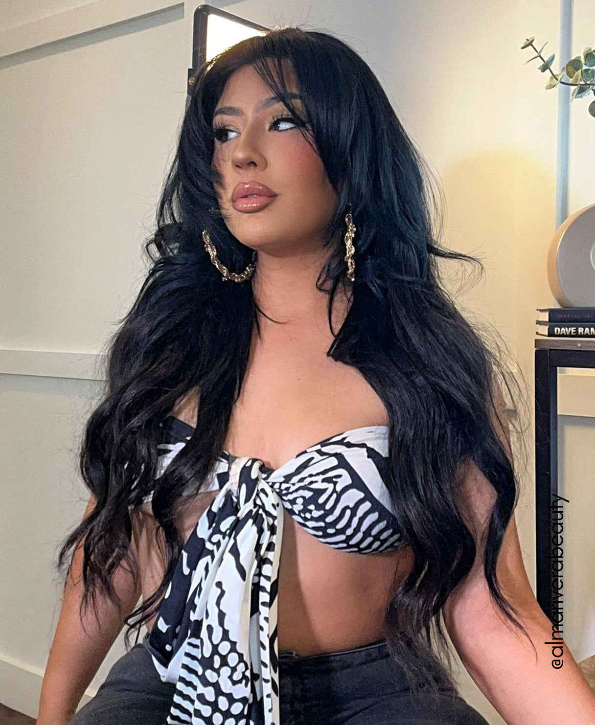 woman wearing jet black clip in hair extensions lifestyle picture