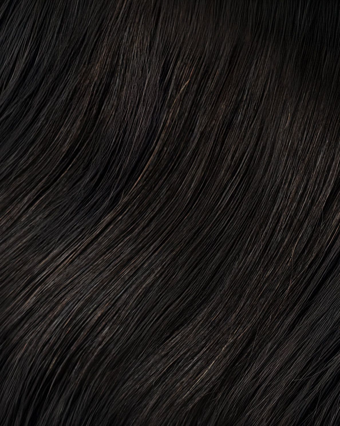 invisible clip-in hair extensions natural black.