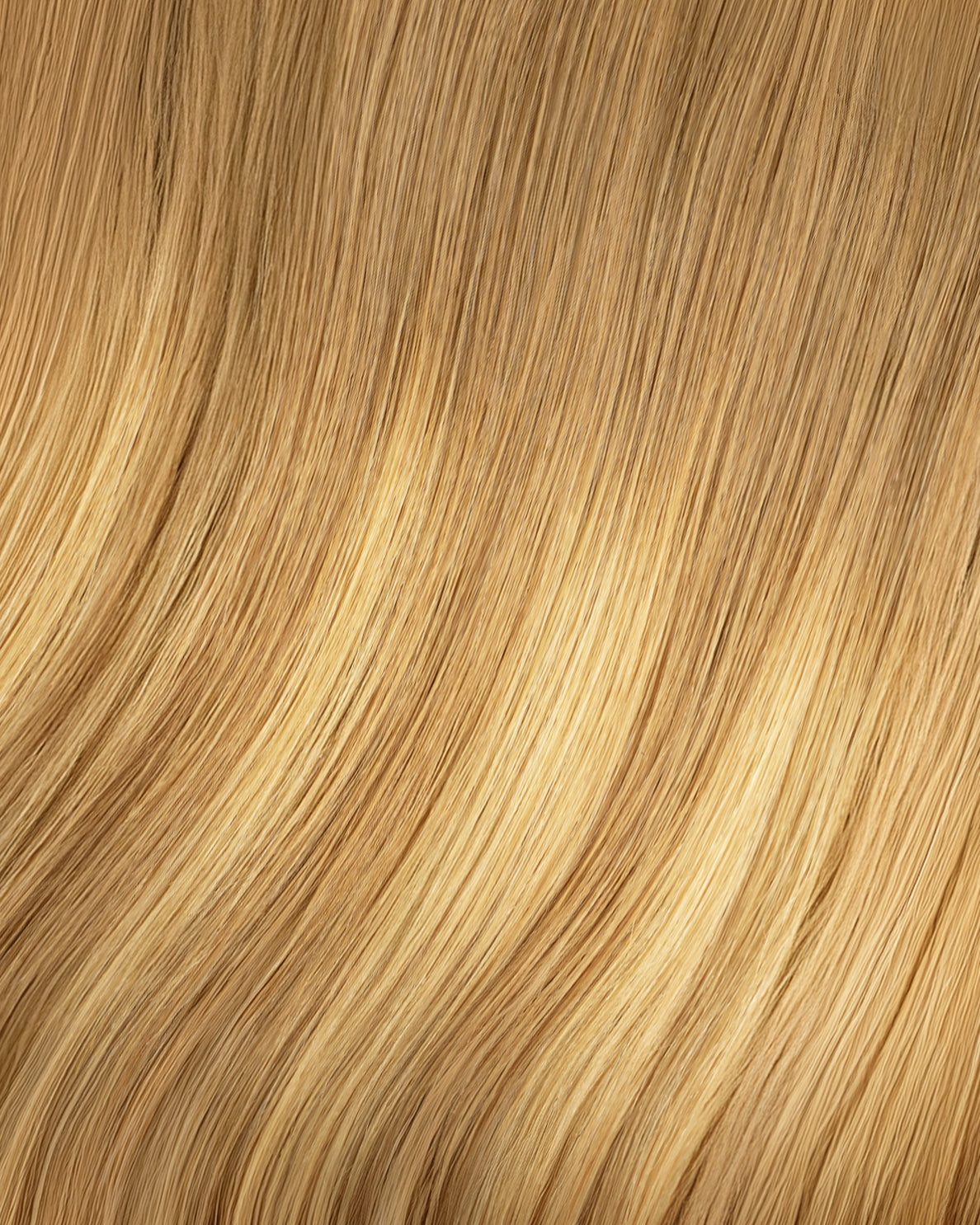 tape-in hair extensions blonde balayage.