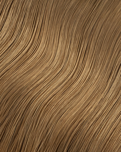 woman wearing irresistible me medium blonde clip in hair extensions