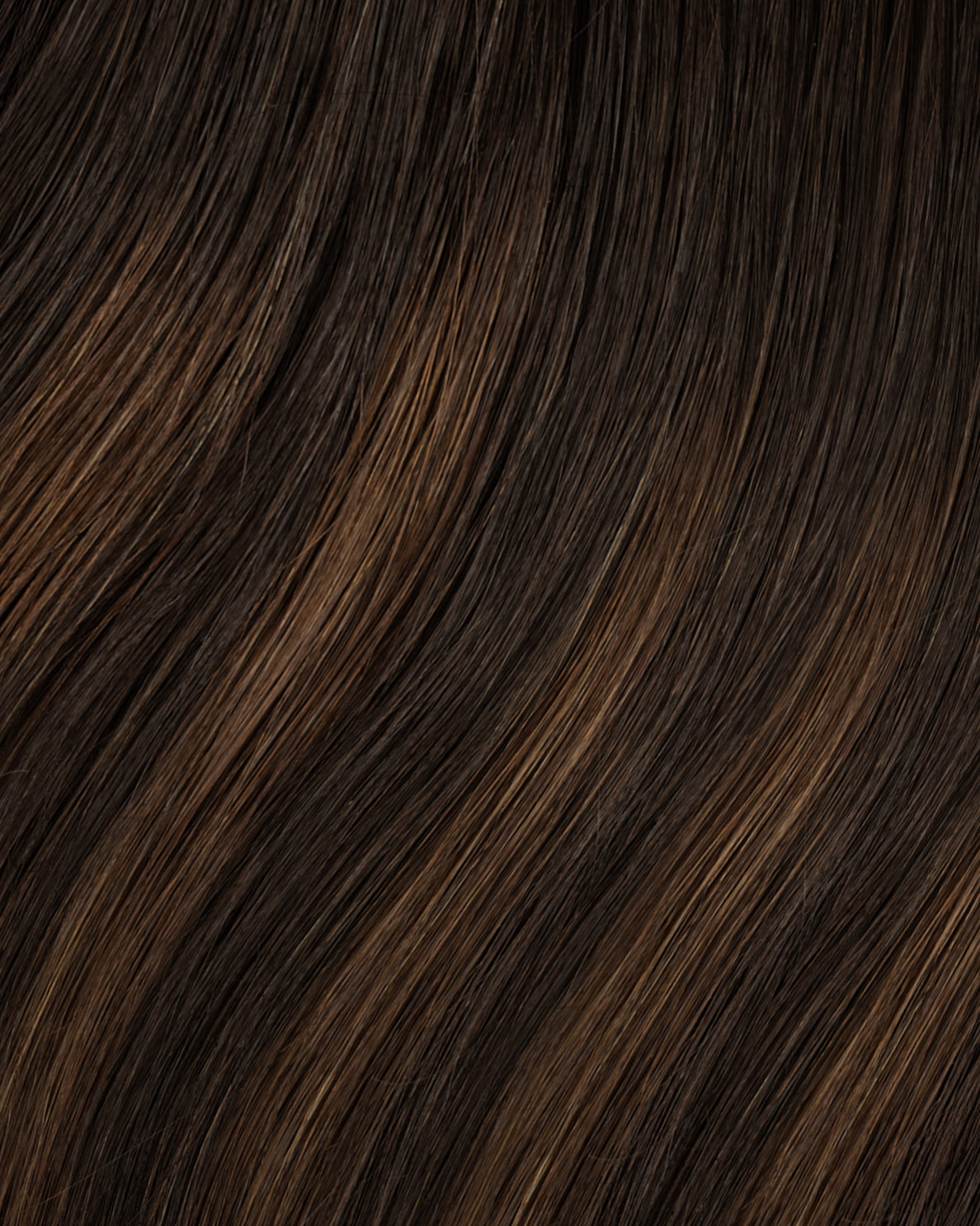 tape-in hair extensions mocha balayage.