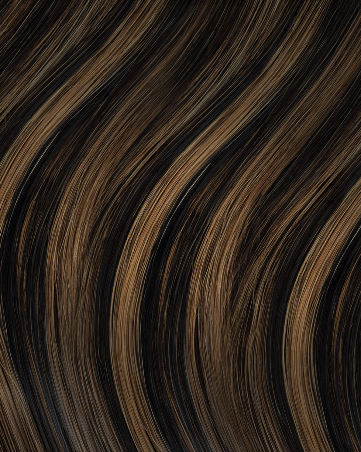 invisible clip-in hair extensions dark highlights.