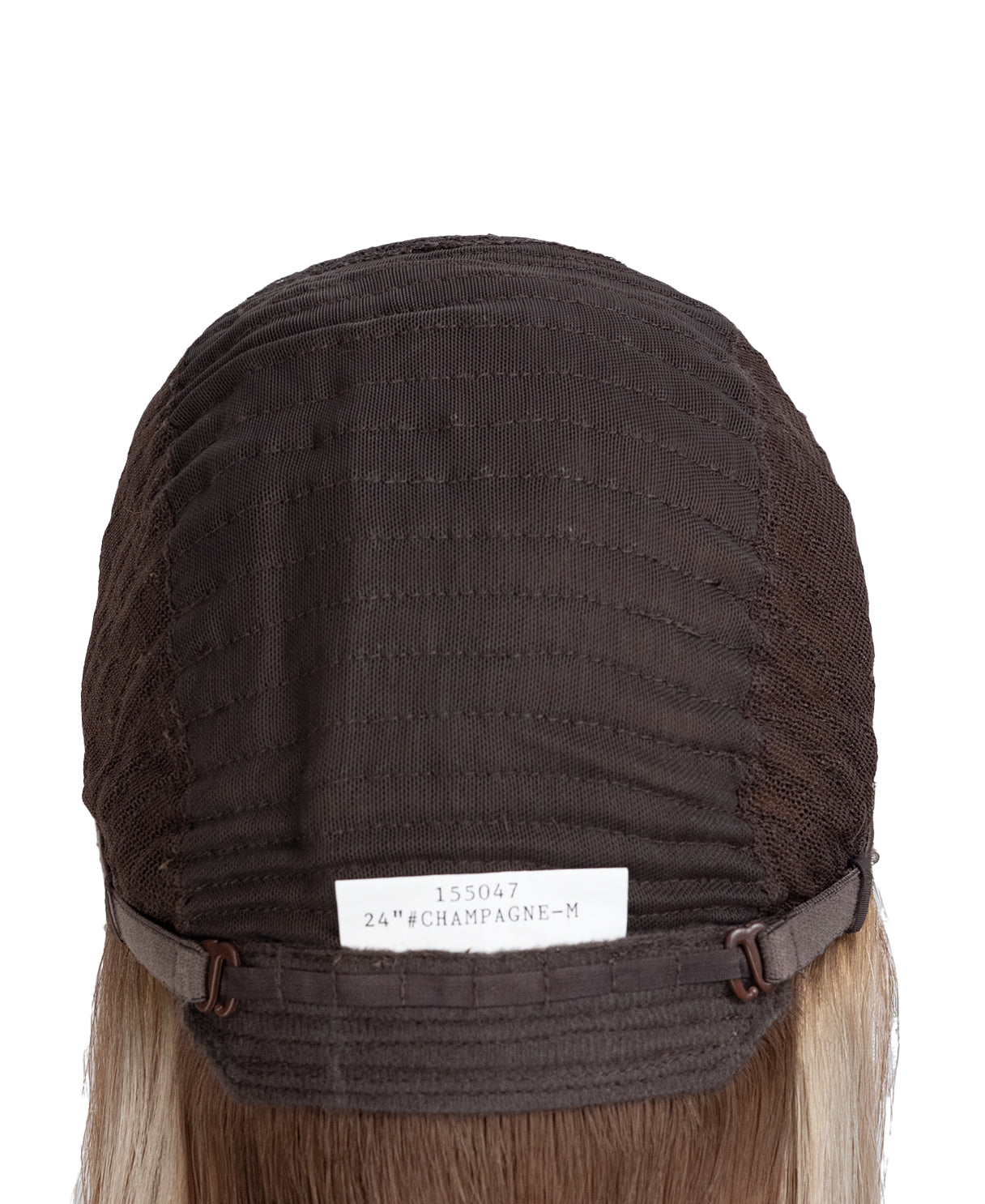 Brown wig cap with a label on a white background