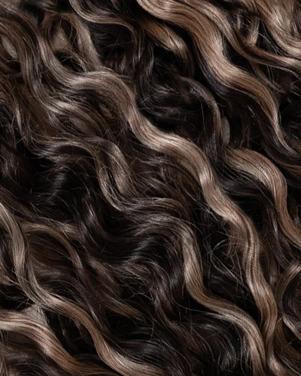 curly (3A curls) clip-in hair extensions ash brown balayage.
