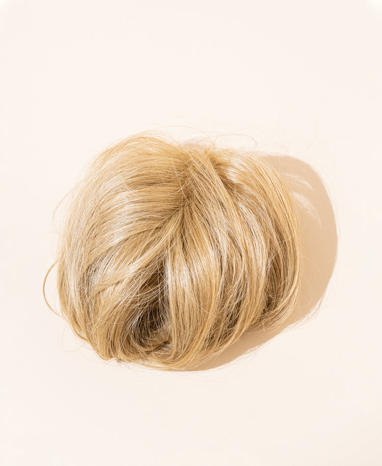 messy bun - honey blonde.