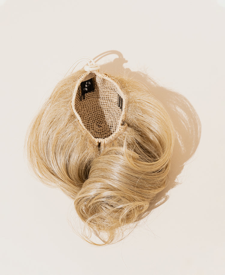 messy bun - honey blonde.