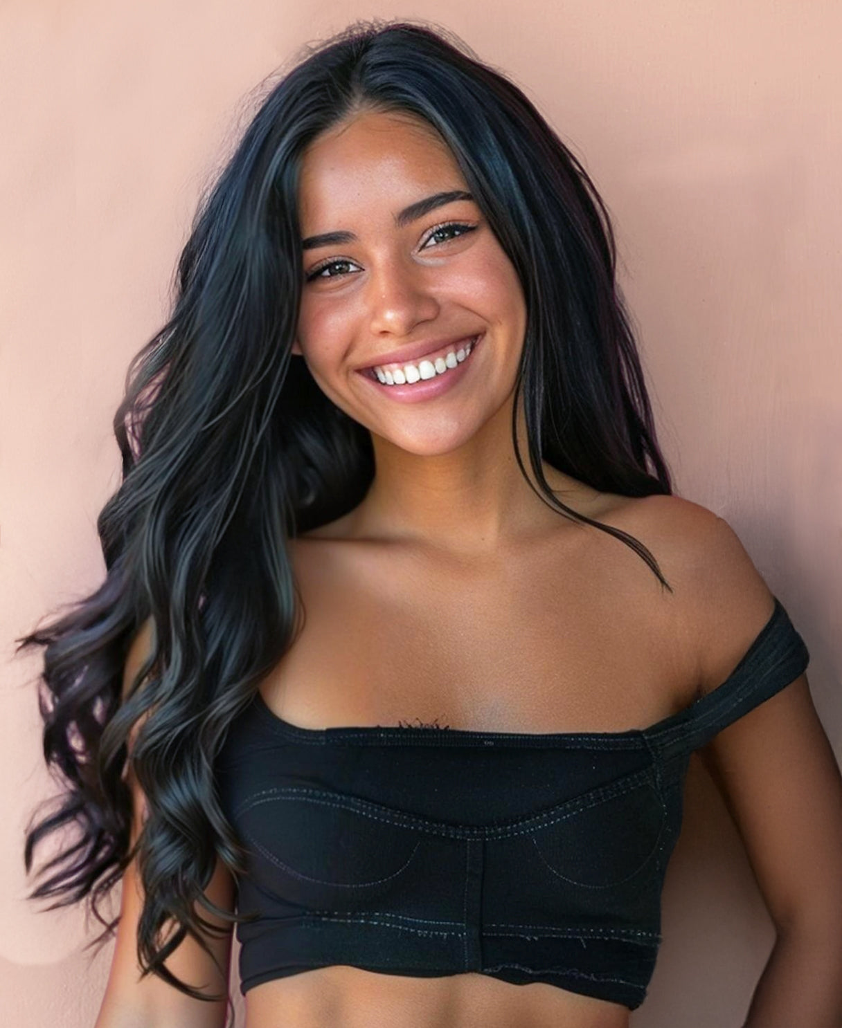 This image features a woman showcasing the clip-in hair extensions in jet black. The extensions appear lush and dense, providing significant volume and length.