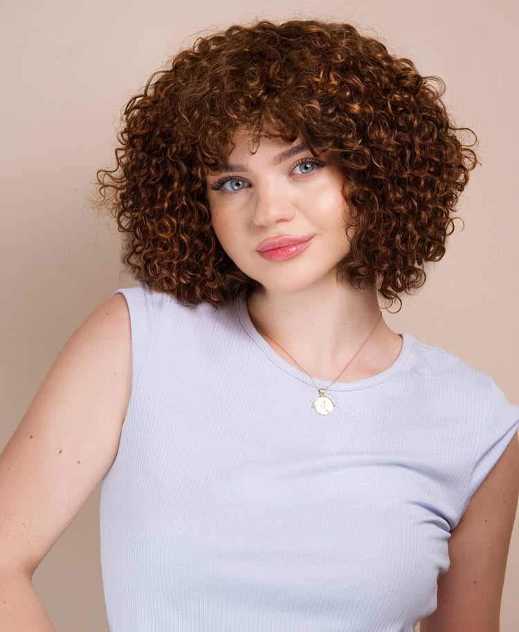 curly human wig - 10” caramel balayage.