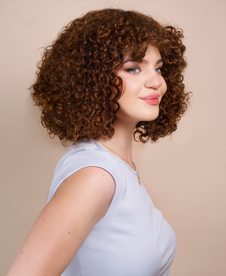 curly human wig - 10” caramel balayage.