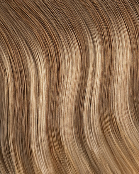 tape-in hair extensions teddy blonde balayage.