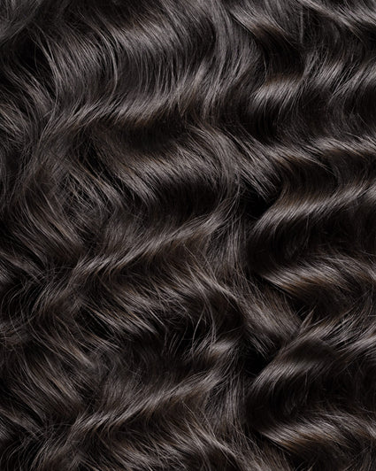 curly invisible tape-in hair extensions natural black.