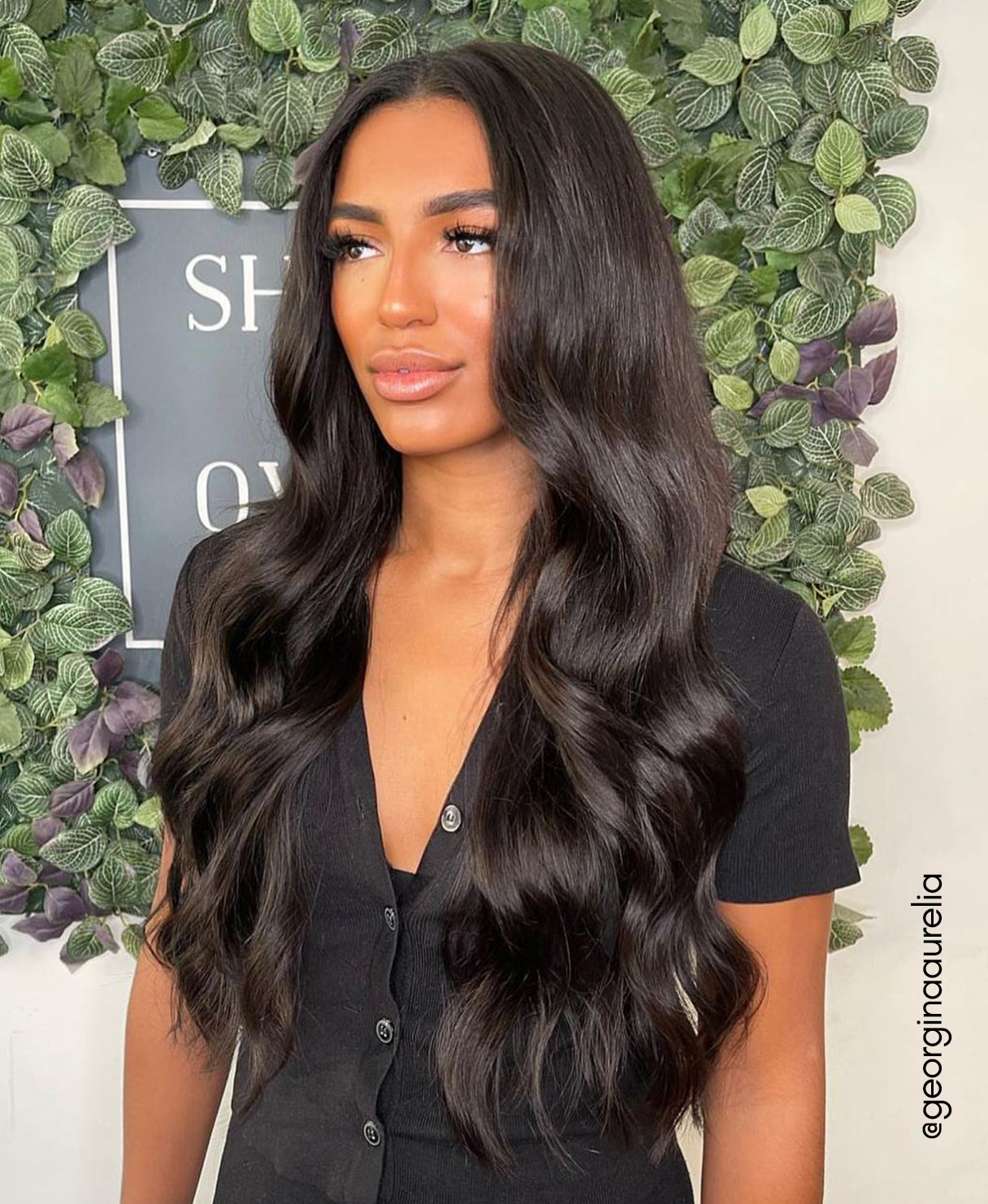 model wearing dark brown extensions