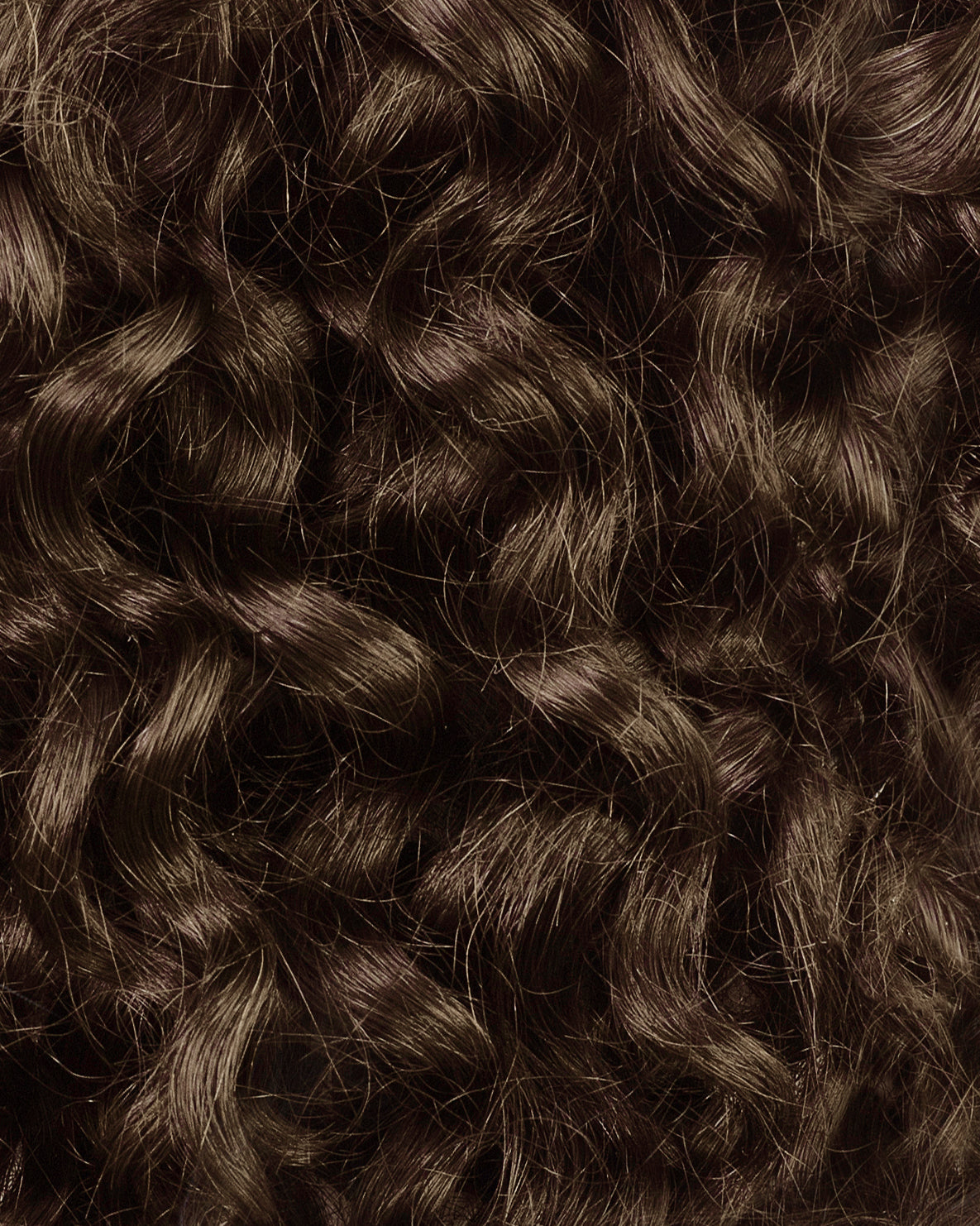curly (3A curls) clip-in extensions light brown.