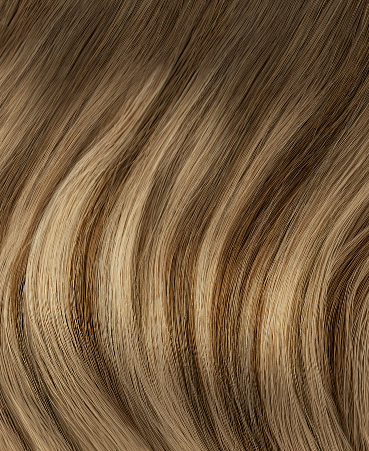 clip-in hair extensions teddy blonde balayage.