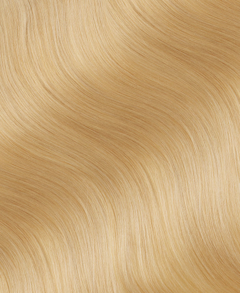 invisible clip-in hair extensions honey blonde.