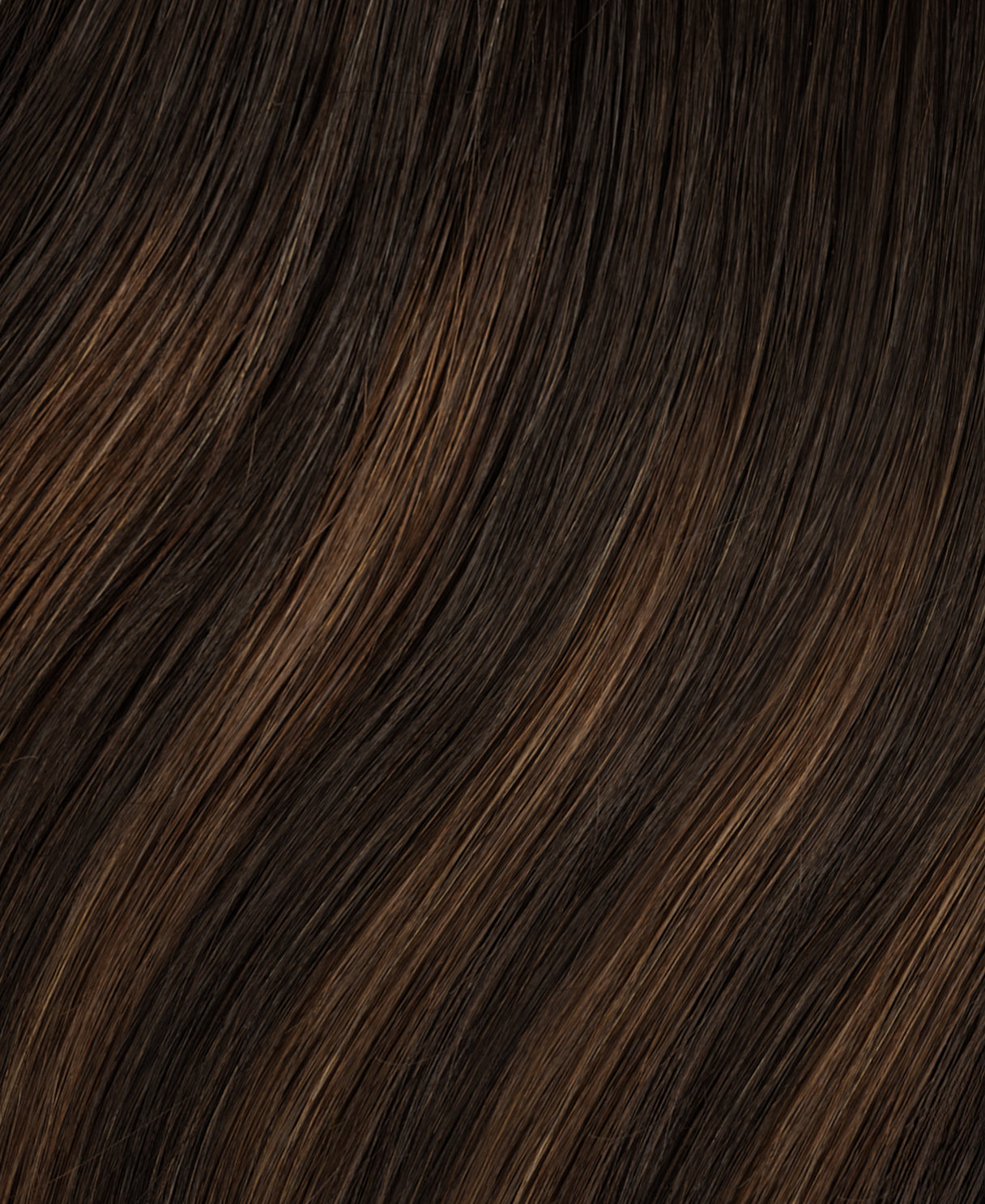 tape-in hair extensions mocha balayage.