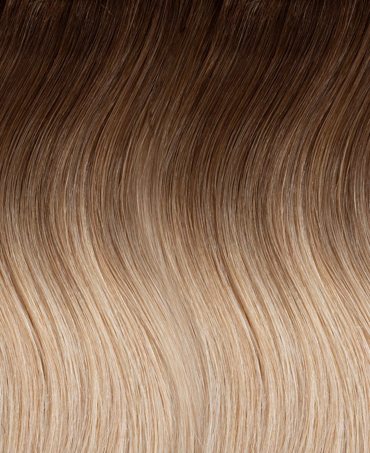 tape-in hair extensions dirty blonde rootmelt.