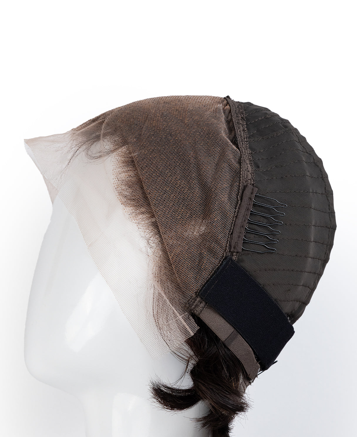 Mannequin head with a brown wig on a white background