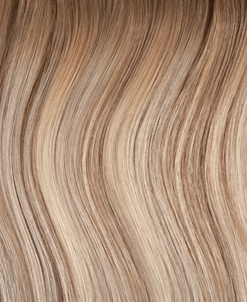 clip-in hair extensions rooted blonde highlights.